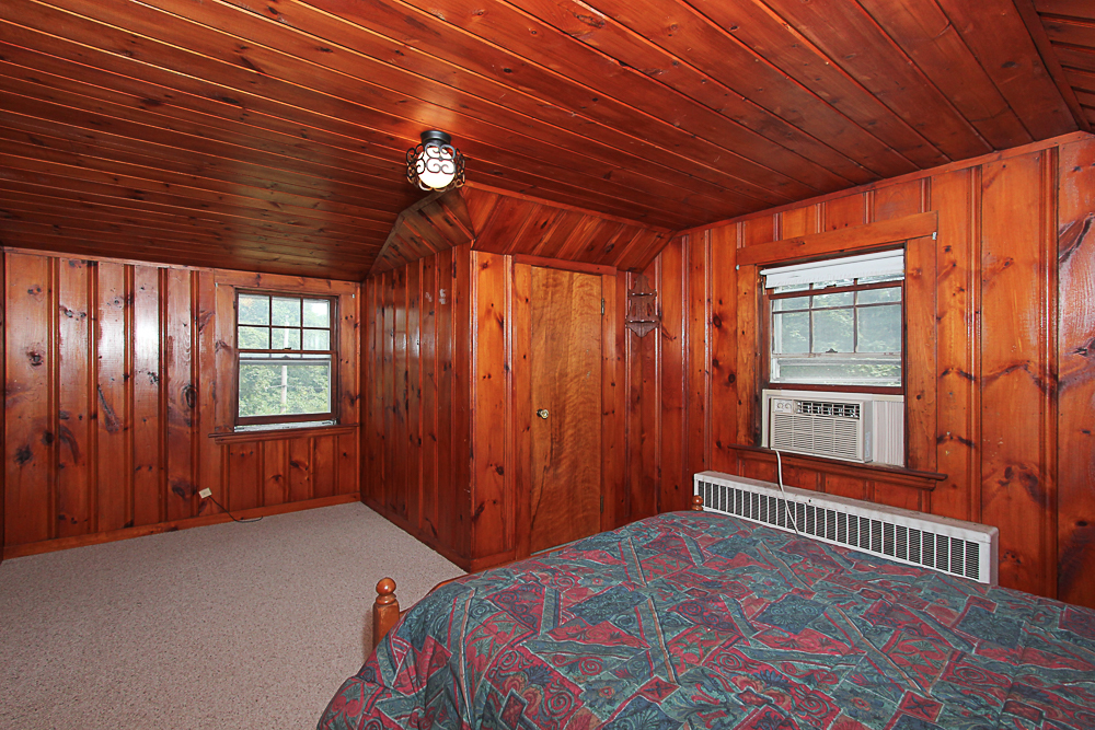 Pine paneled bedroom at 31 Decatur Street Gloucester Massachusetts
