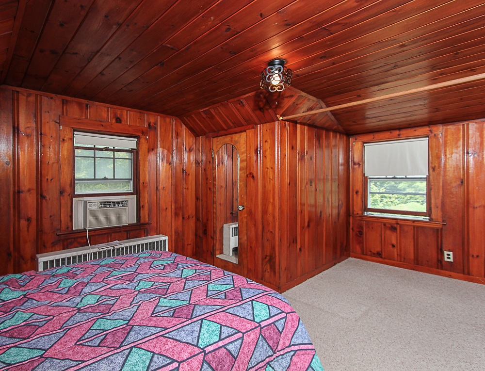 Paneled bedroom at 31 Decatur Street Gloucester Massachusetts