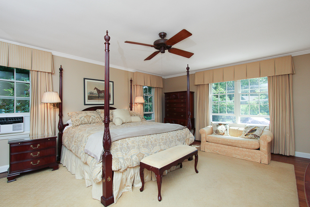 Main bedroom with ceiling fan at 48 Boren Lane Boxford Massachusetts