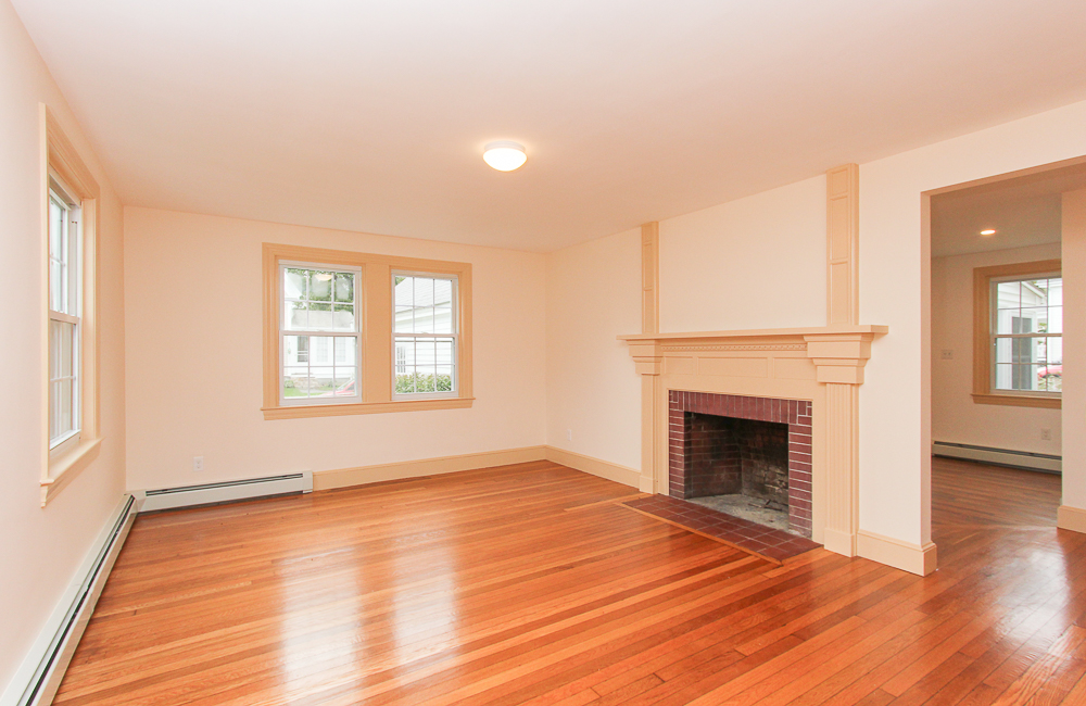 Living room with hardwood floors and fieplace 80 Union Street Hamilton Massachusetts