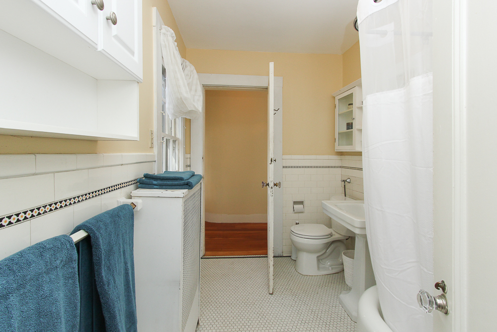 Shared Bathroom with tiled floor 160 Locust street Danvers Massachusetts