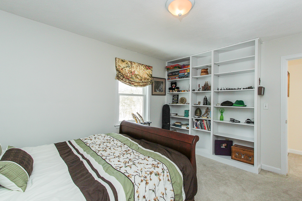 Bedroom with built-in bookcase 140 Bridge Street Hamilton Massachusetts
