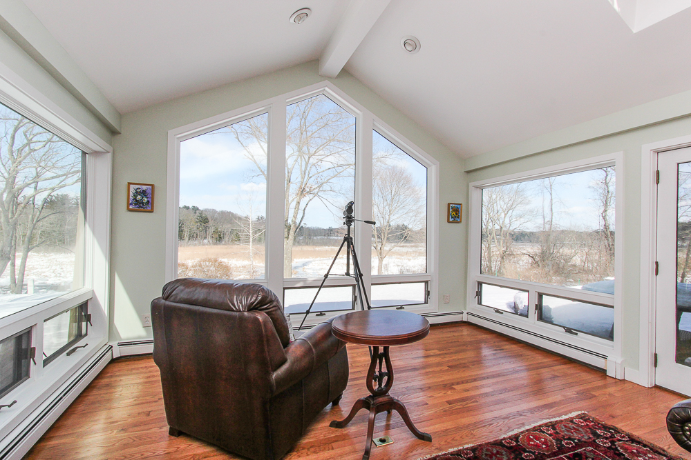 Living room with large windows 140 Bridge Street Hamilton Massachusetts