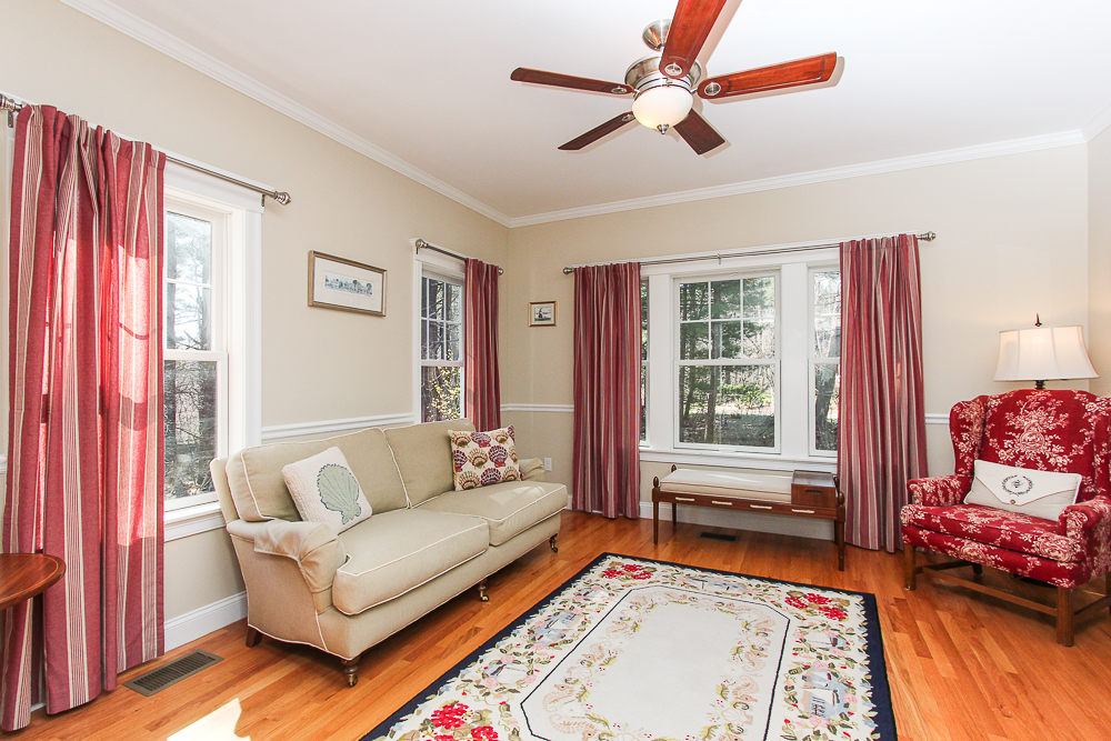 Living room with hardwood floors and ceiling fan 41 Beaver Pond Beverly Massachusetts
