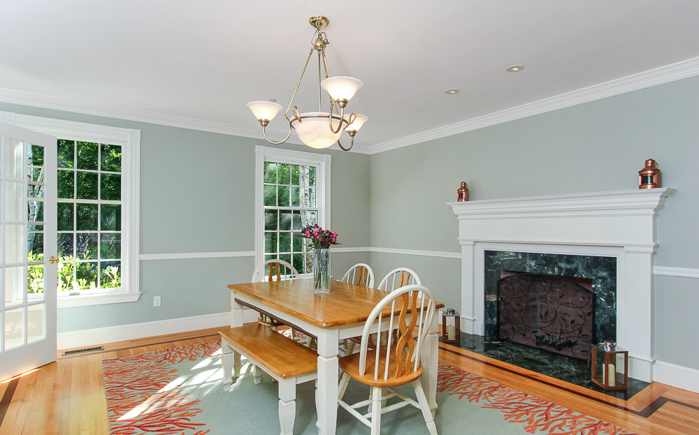 Dining room with fireplace and hardwood floors 8 Gussett Road Wenham Massachusetts