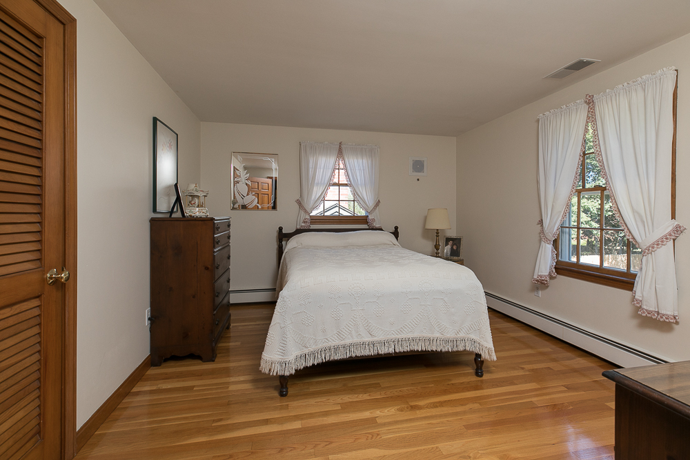 Bedroom with hardwood floors at 159 McKay Street Beverly Massachusetts