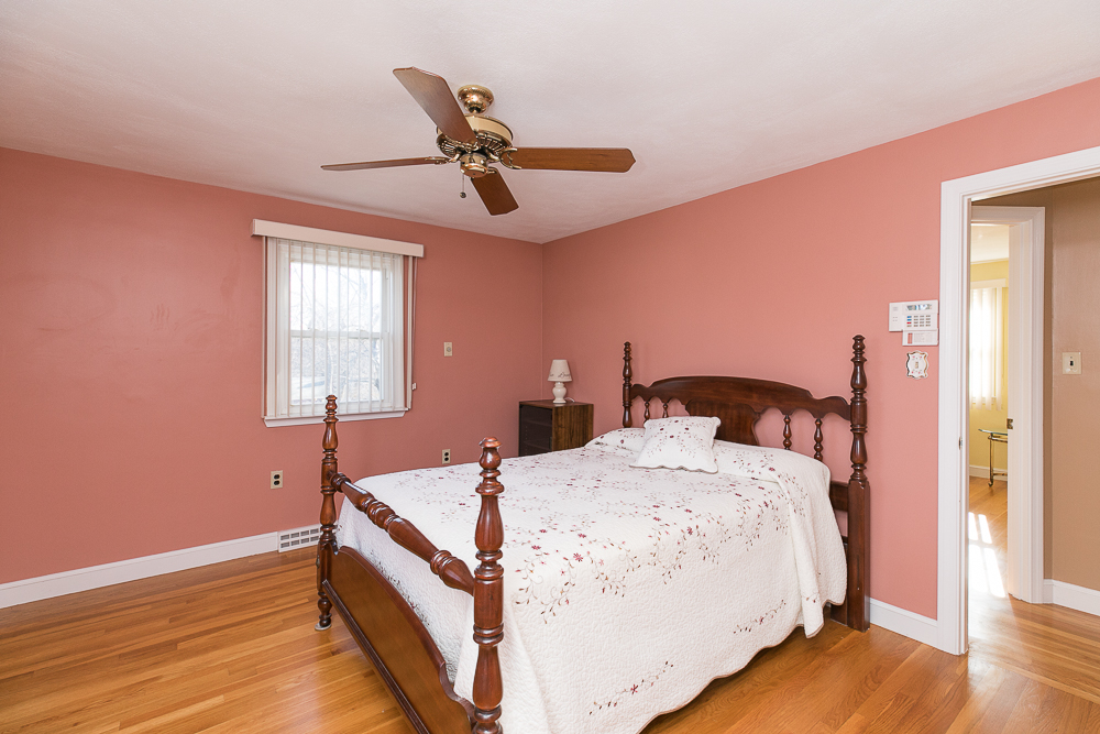 Main bedroom with hardwood floors and ceiling fan 8 Pond Street Peabody Massachusetts