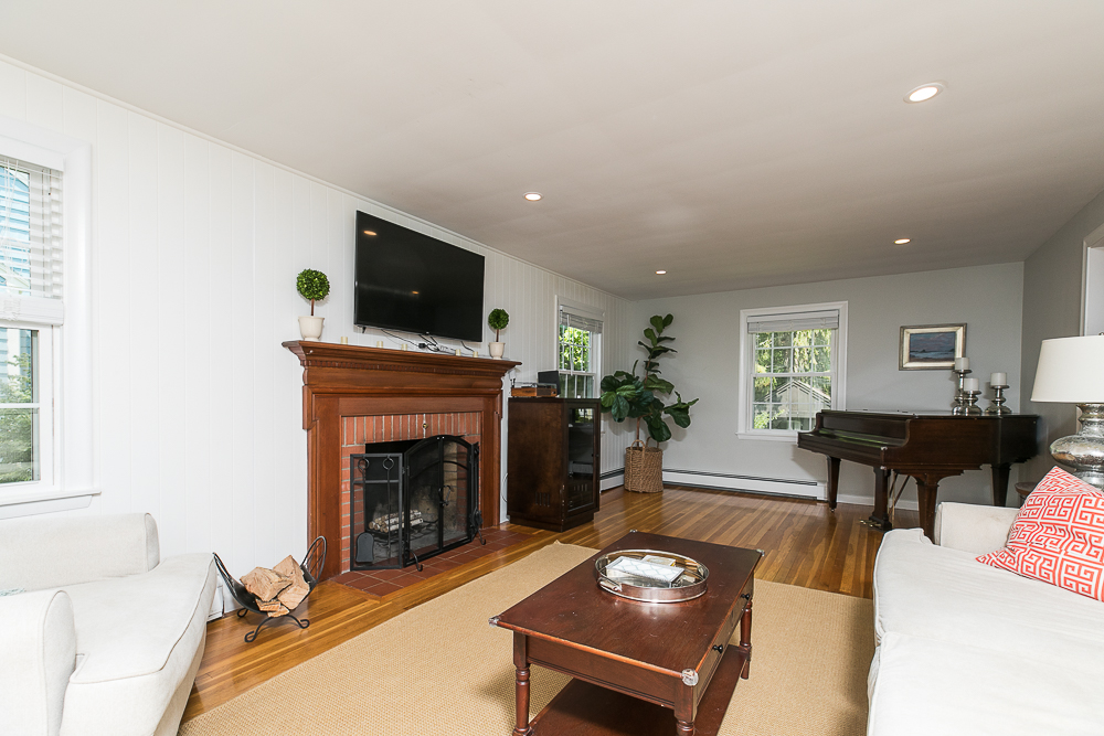 Living room with fireplace 300 Essex Street Hamilton Massachusetts