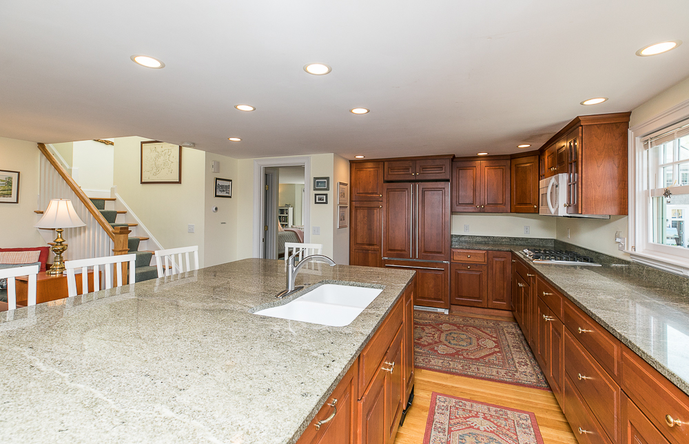 Granite Island and kitchen in the penthouse 1 Main Street Rockport Massachusetts