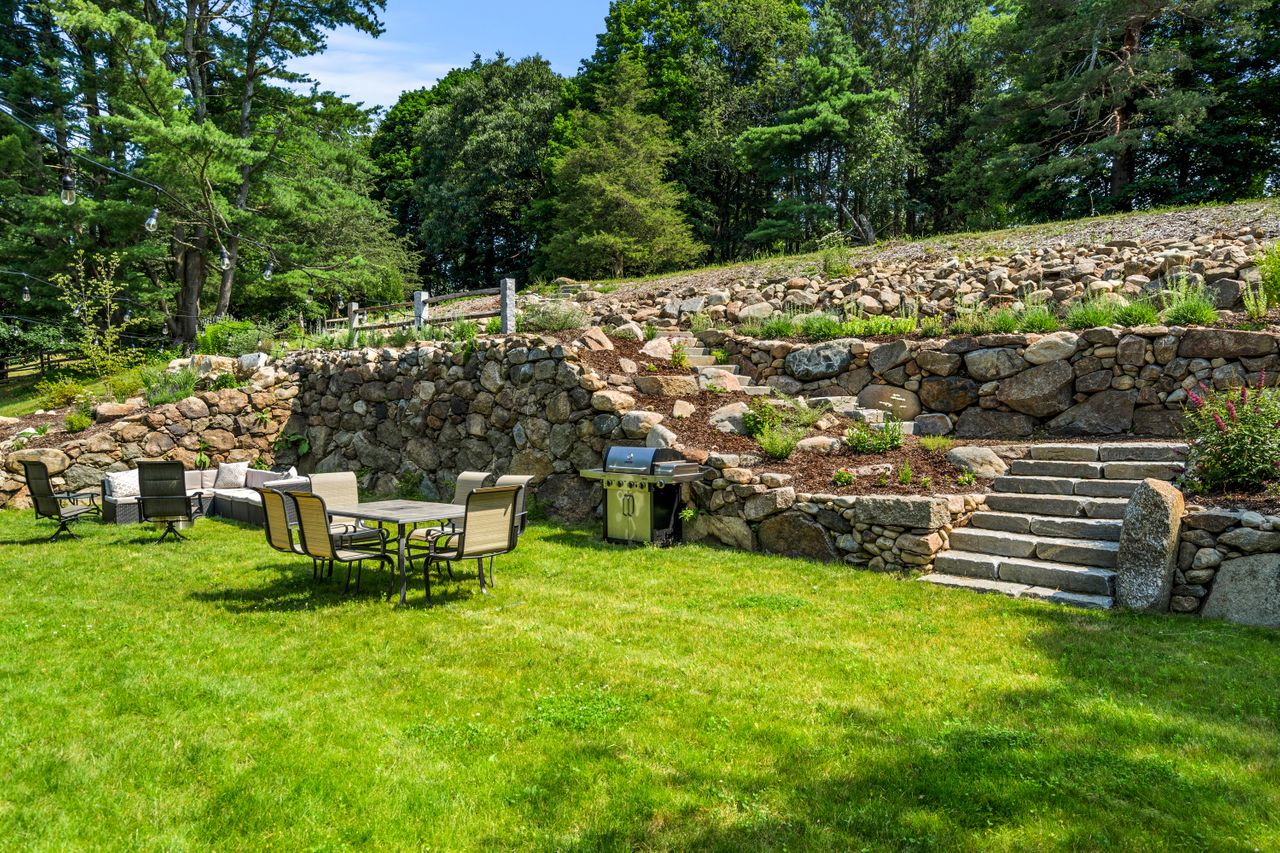 back yard showing steps to the terraced gardens 235 Larch Row Wenham MA
