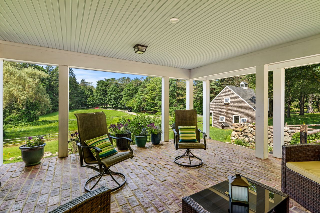 Patio with the barn in the background at 235 Larch Row Wenham MA