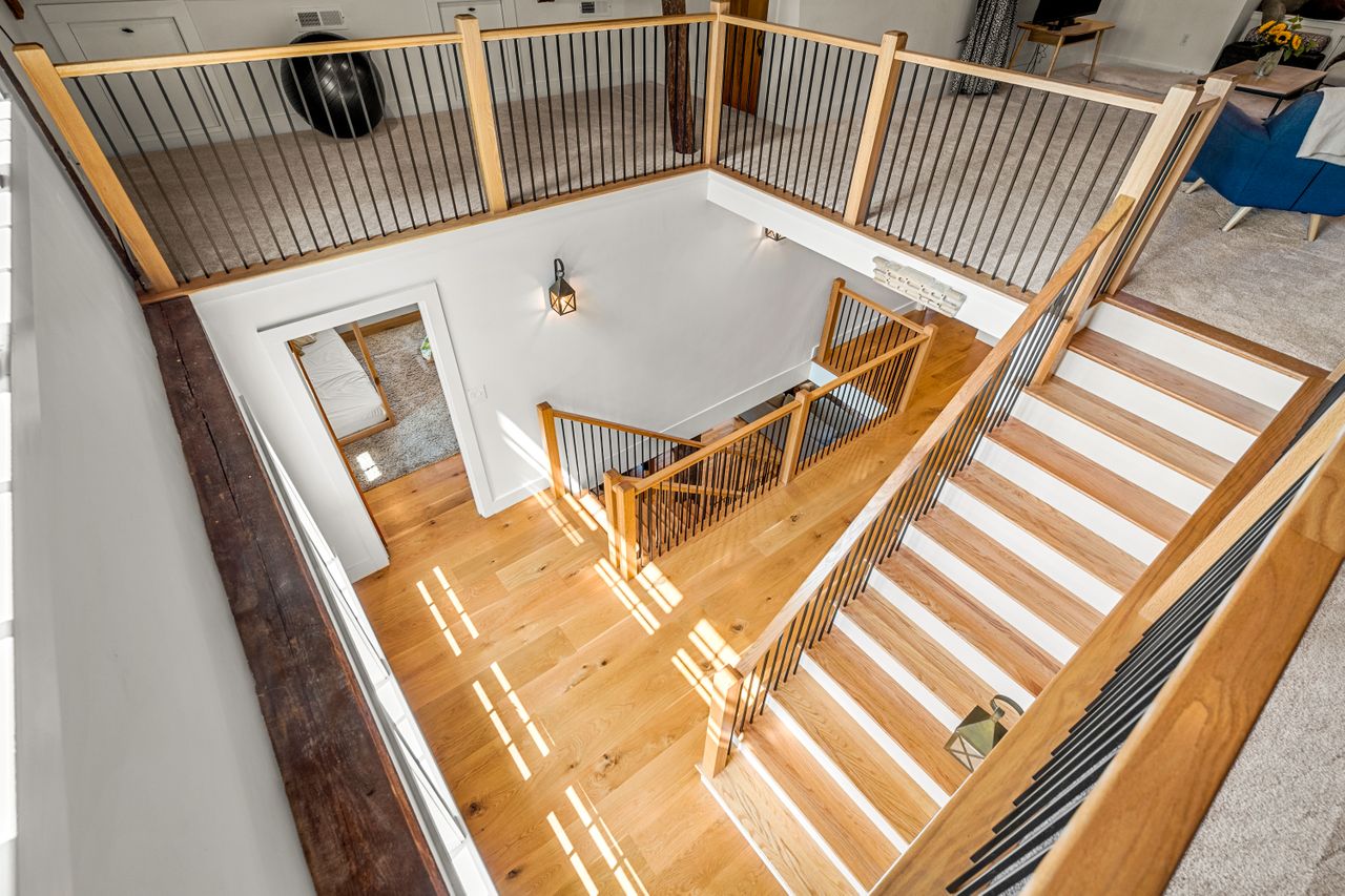Stairway from the loft to the second floor wood floors 235 Larch Row Wenham MA